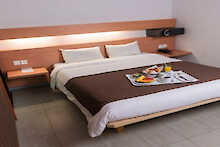 Doppelbett im Hotel Onomo