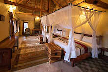 Kafue River Lodge Schlafzimmer mit zwei Doppelbetten