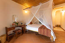 Utengule Coffee Lodge Standard Schlafzimmer mit Doppelbett
