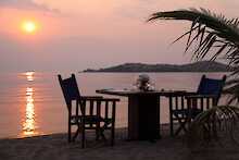 Speisen mit Sonnenuntergang und Blick auf Lake Tanganyika