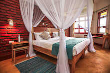 Baghayo Garden Suite Zimmer mit Doppelbett