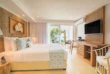 Schlafzimmer im Deluxe-Zimmer