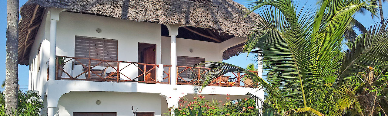 Außenansicht der Zimmer des Blue Oyster Hotel