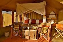 Schlafzimmer im Kenzan Tented Camp Ndutu Zelt