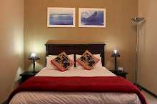 gemütliches Zimmer mit Doppelbett im Klein Windhoek Guesthouse