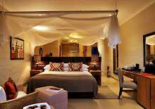 Doppelzimmer mit entspannter Atmosphäre im Victoria Falls Safari Club