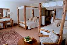 Doppelzimmer mit Holzbetten