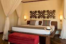 Doppelzimmer mit gemütlichen Bett im Essque Zulu